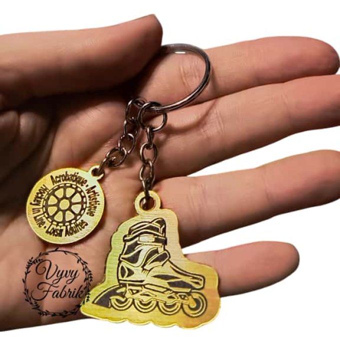 porte clé roller artistique en acrylique couleur or gravé club de roller