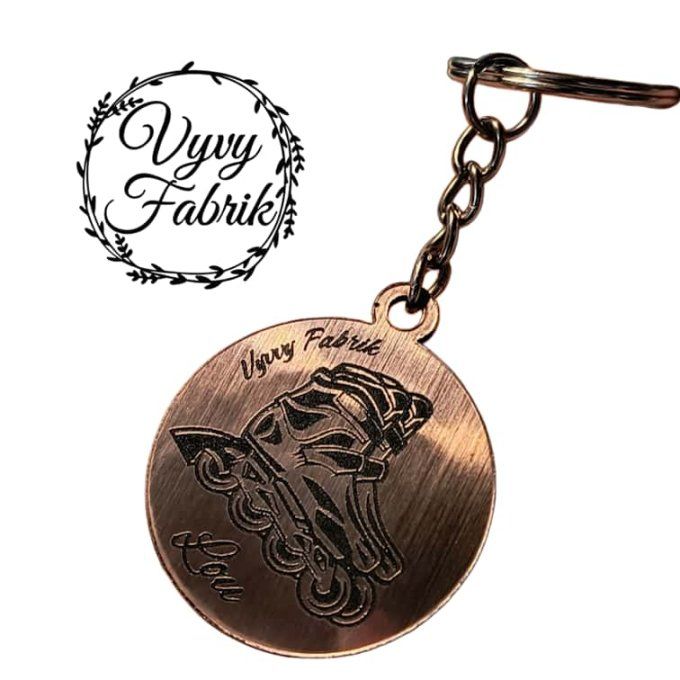 porte clé rond roller en acrylique couleur or rose gravé club de roller